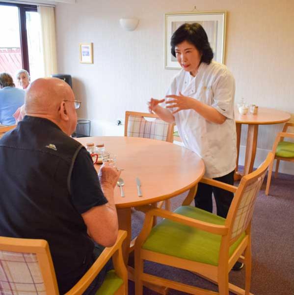 Jian Wang Talking To Tenant