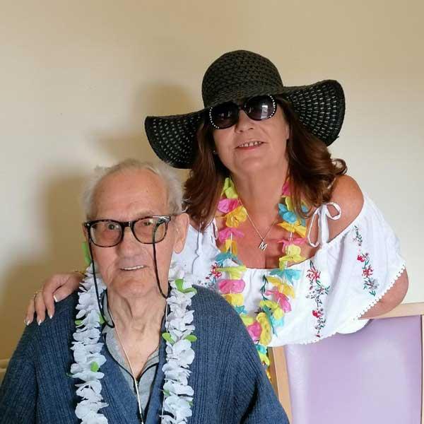 Staff And Tenant Dressed For Summer Bbq